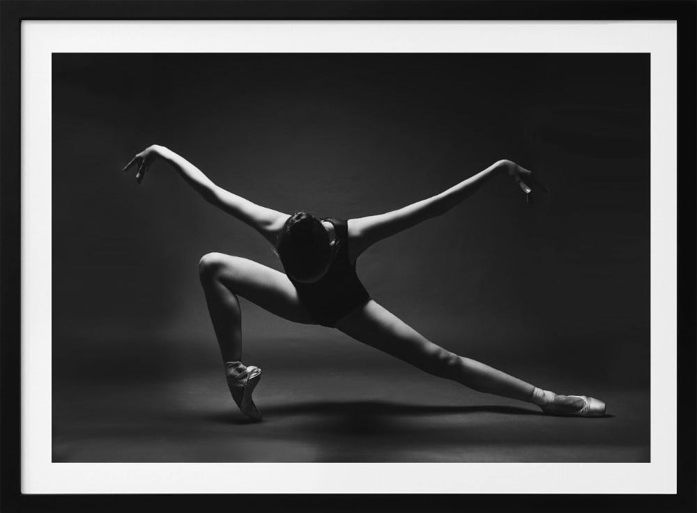 soaring. A ballerina in pointe shoes in a lunge with her arms outstretched like wings - Poster / Art Print