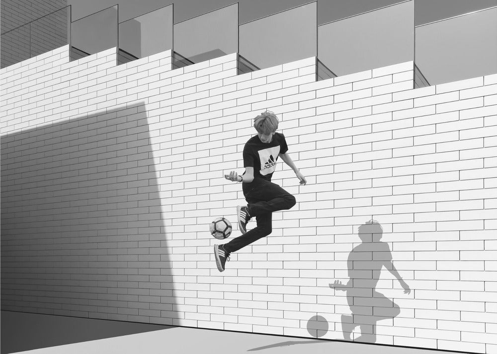 Boy with football - Poster / Art Print