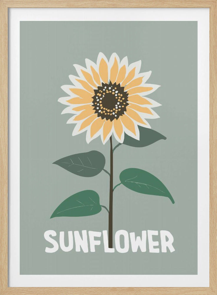 A stylized illustration of a single sunflower against a muted sage green background. The flower has yellow and white petals, a dark brown center, and a thin brown stem with green leaves. At the bottom, the word 'SUNFLOWER' is written in a bold, white, sans-serif font. The artwork is presented within a simple black frame. Decor