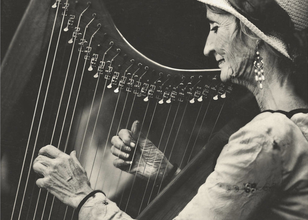 Playing the Harp - Poster / Art Print