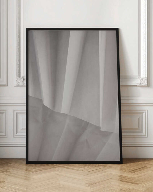 Abstract art print of folded white fabric or paper creating soft lines and deep shadows.