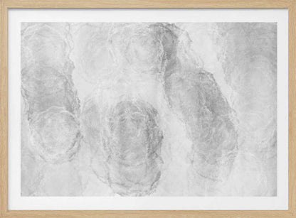 Abstract art with soft, cloud-like shapes in shades of grey and white, set in a silver frame.