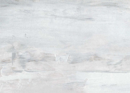 Abstract wall art with textured white and grey brushstrokes in a silver frame.