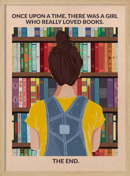 An illustrated poster with a vintage feel, showing the back of a girl with brown hair in a bun, wearing a yellow shirt and blue overalls. She is looking at a tall bookshelf filled with colorful books. Text at the top reads 'ONCE UPON A TIME, THERE WAS A GIRL WHO REALLY LOVED BOOKS.' and text at the bottom reads 'THE END.' The poster is enclosed in a black frame. Artwork