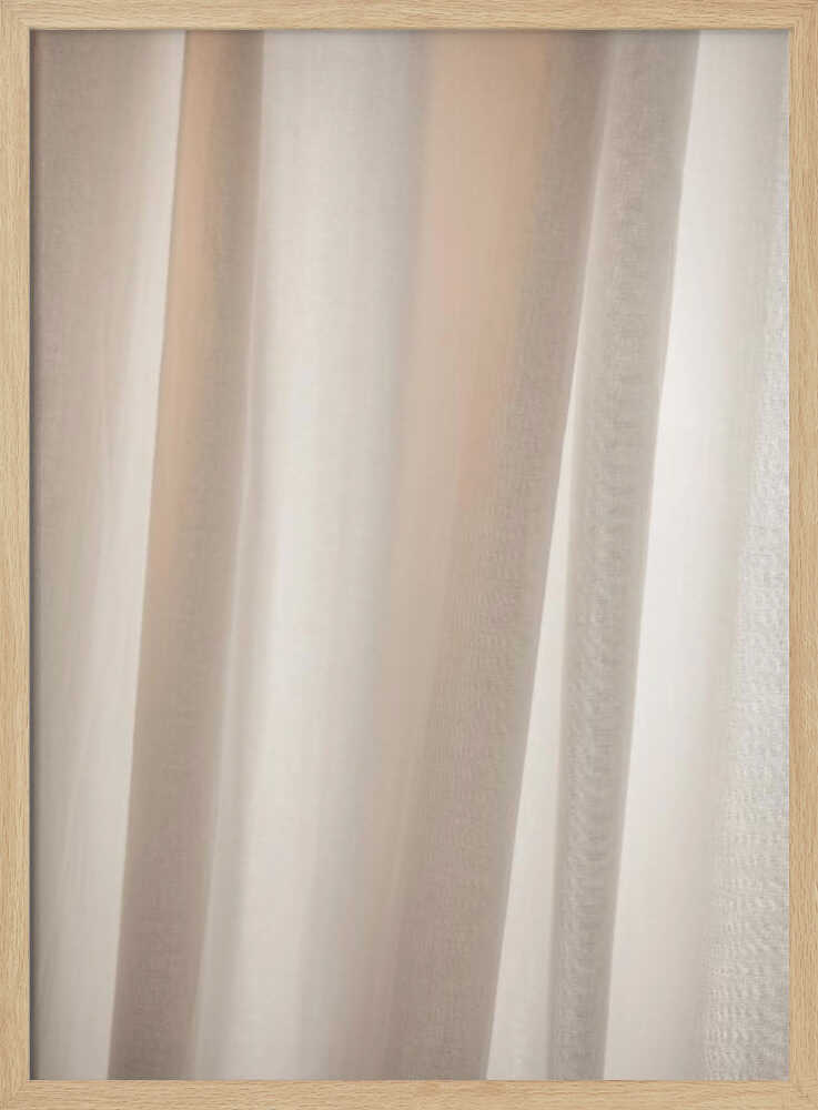 Abstract photo of light beige fabric with soft, flowing folds creating gentle shadows.