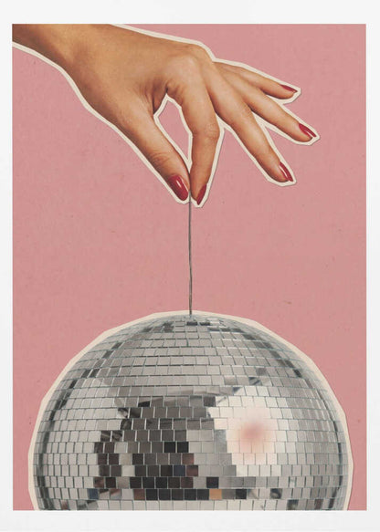 Retro collage art of a hand with red nails holding a silver disco ball against a pink background.