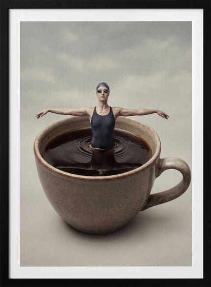 Surreal art print of a woman in a swimsuit swimming in a giant cup of coffee.