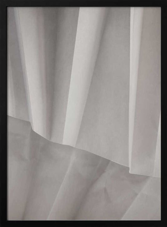 Abstract art print of folded white fabric or paper creating soft lines and deep shadows.