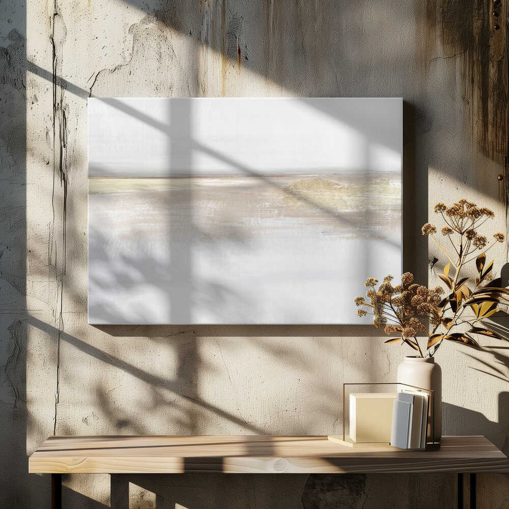 Abstract landscape art in neutral beige and white tones with shimmering gold details, set in a modern silver frame.