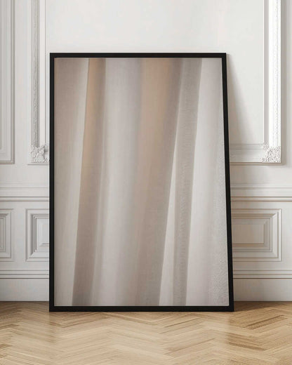 Abstract photo of light beige fabric with soft, flowing folds creating gentle shadows.