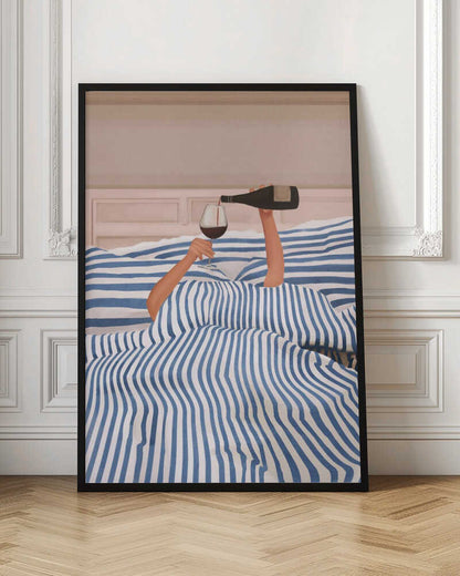 Arms emerging from a blue and white striped duvet to pour a glass of red wine in bed, an illustration.