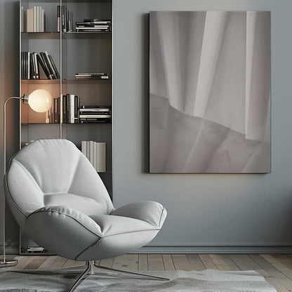 Abstract art print of folded white fabric or paper creating soft lines and deep shadows.