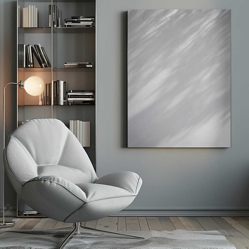 Diagonal leaf shadows cast on a white textured wall, creating a minimalist black and white art piece.