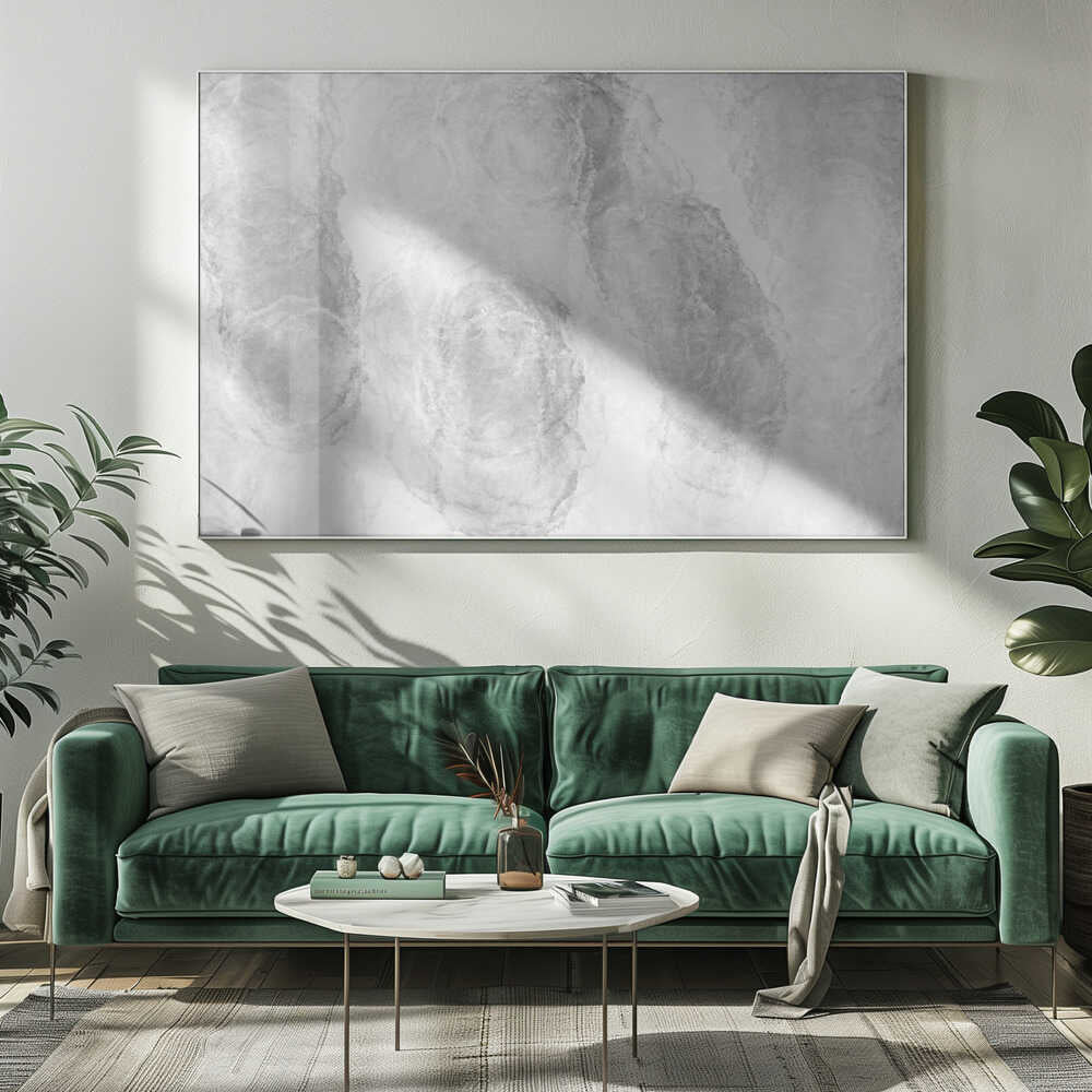 Abstract art with soft, cloud-like shapes in shades of grey and white, set in a silver frame.